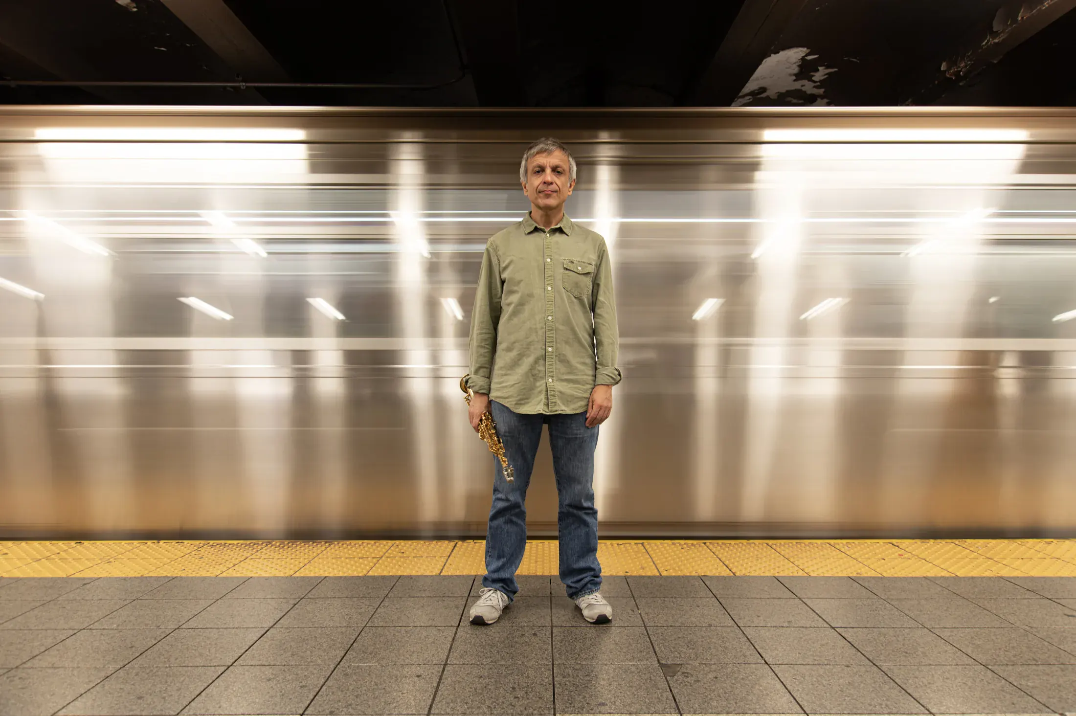Daniele Comoglio portrait with moving train in New York